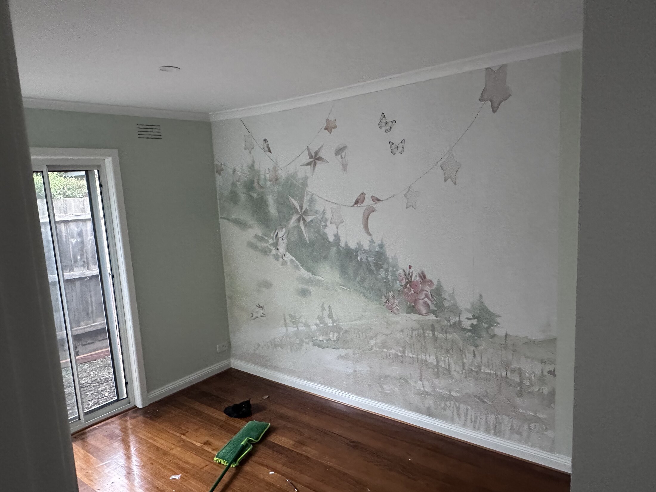 Wall and ceiling damage prepared for plaster repairs before repainting