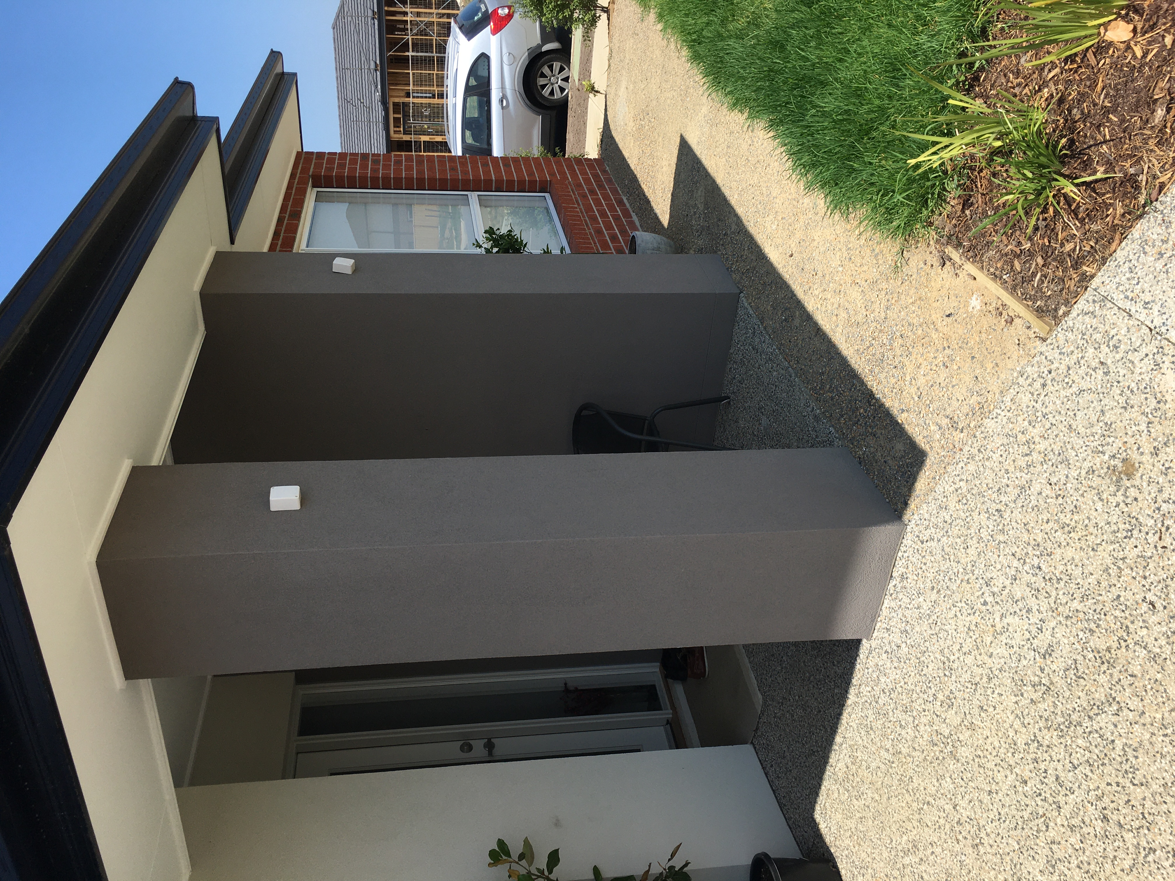 Grey entry columns and exterior trim — from our Bayside projects.