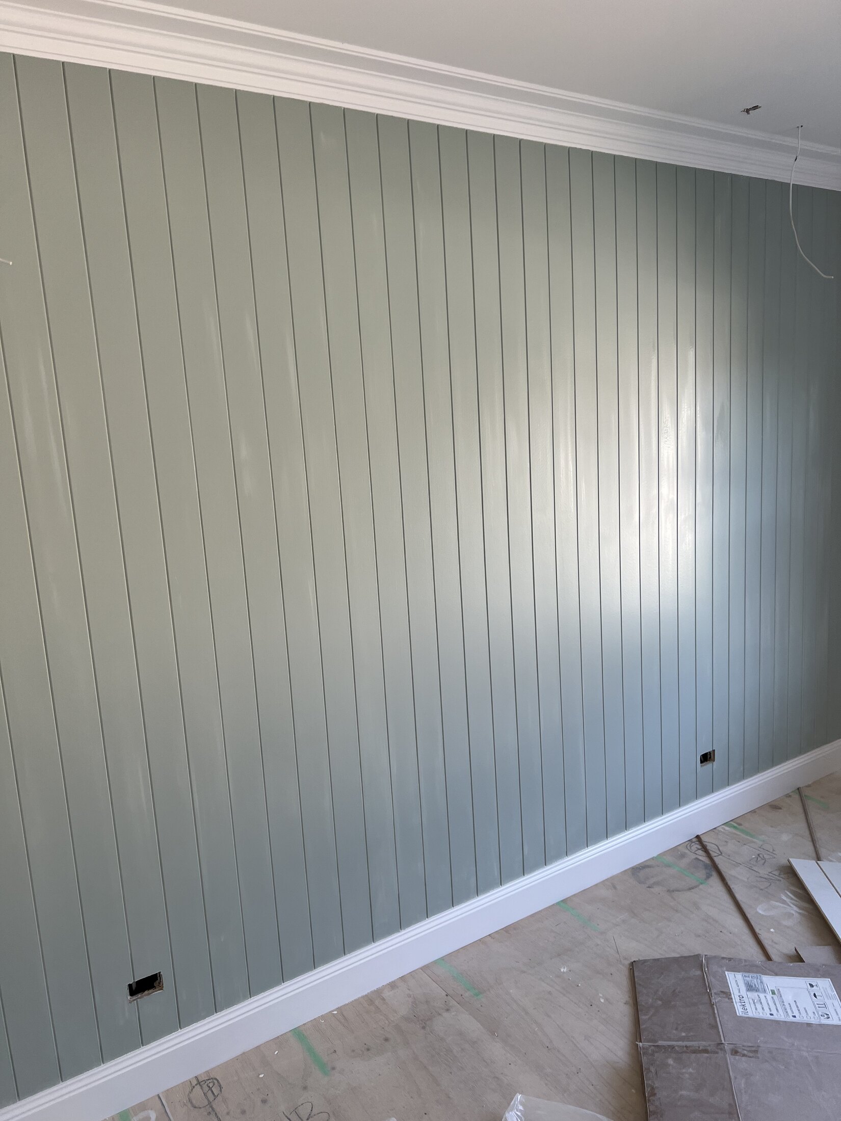 Interior panel wall repaint with smooth preparation and even finish
