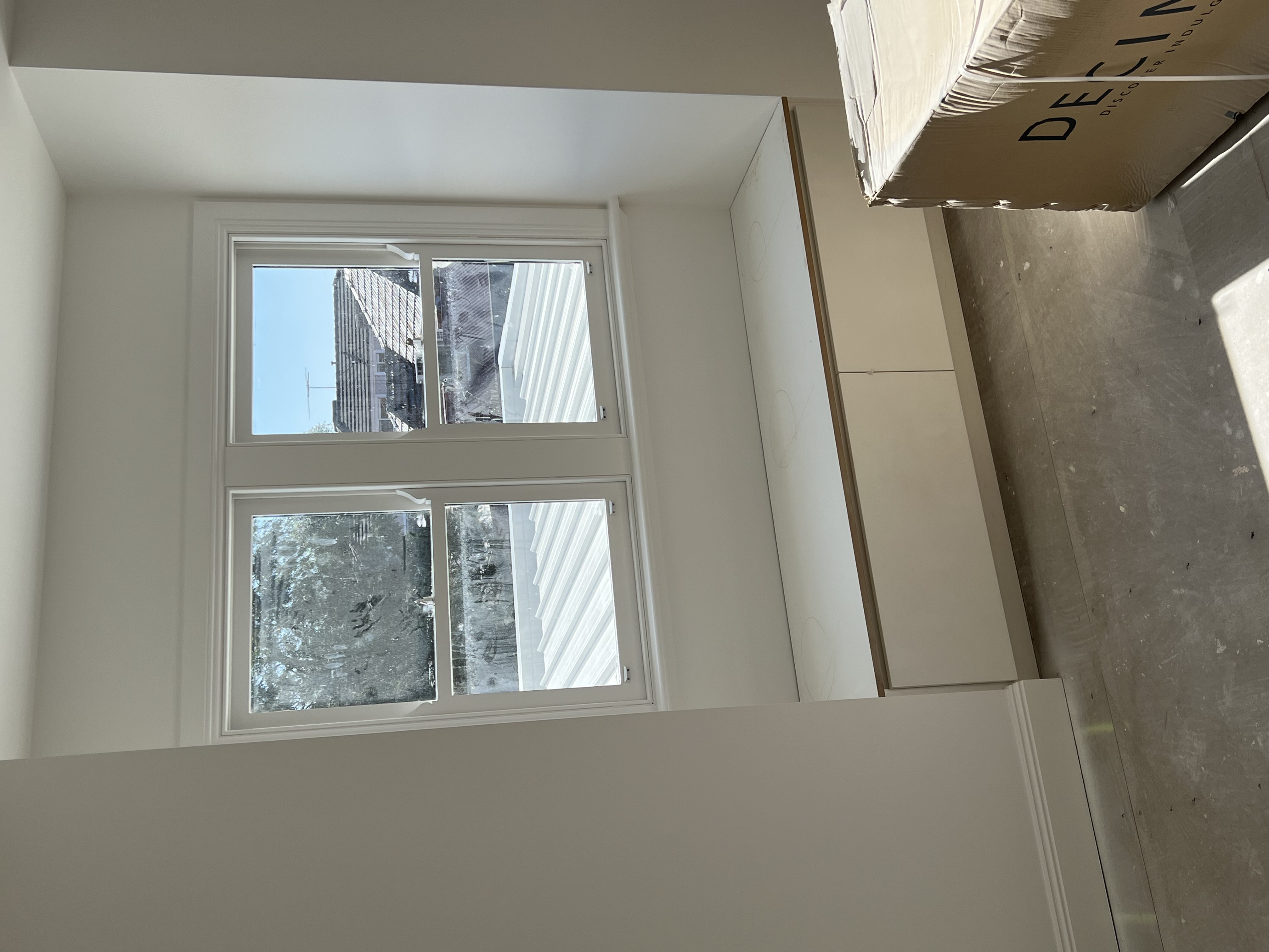 Window seat with white trim and painted walls — from our Bayside projects.